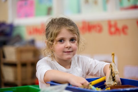 a child playing with toys at little faces nursery in Waterlooville